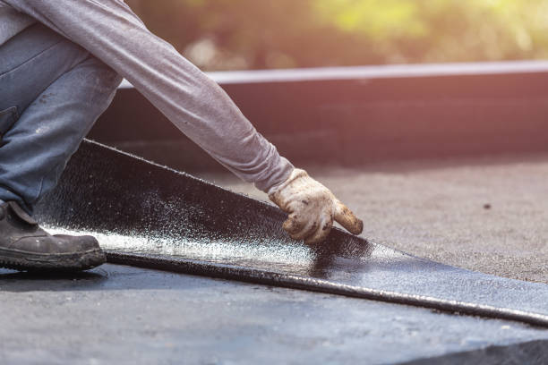 Professional Waterproofing technician working in Munford, AL